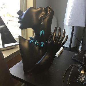 Handmade Turquoise colored stones beaded in black linen cord. Matching earrings,